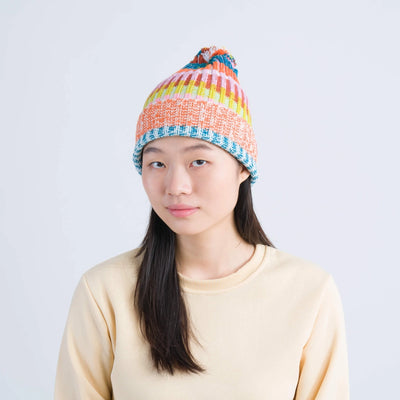Mosaic Stripe Pom Beanie in Rust + Lilac