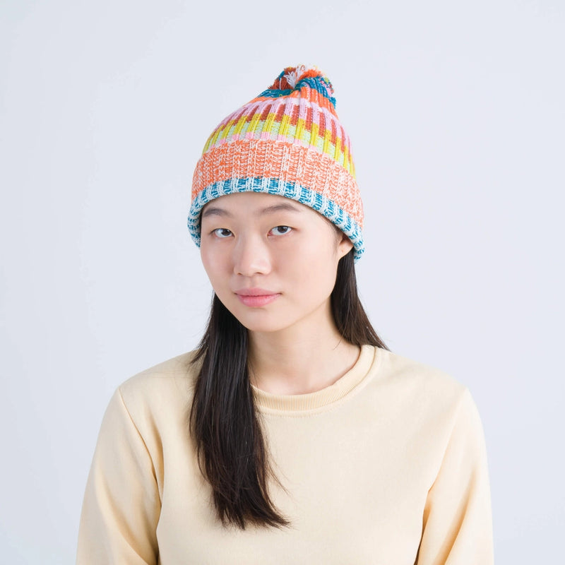 Mosaic Stripe Pom Beanie in Rust + Lilac