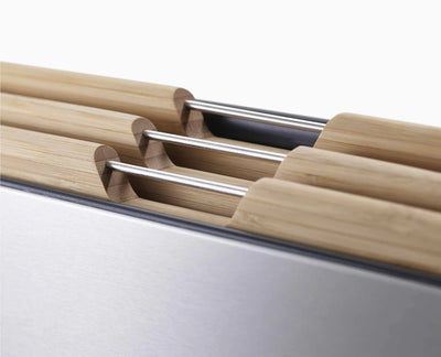 Wooden cutting board with metal handles on a white background