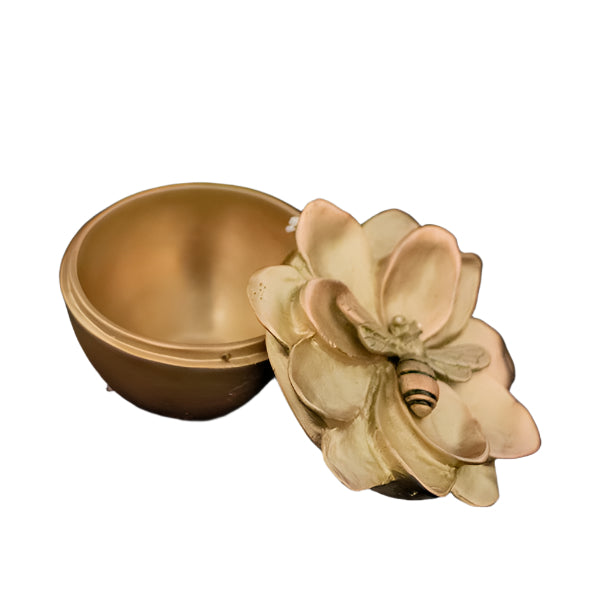 Decorative box with a floral design on a black background