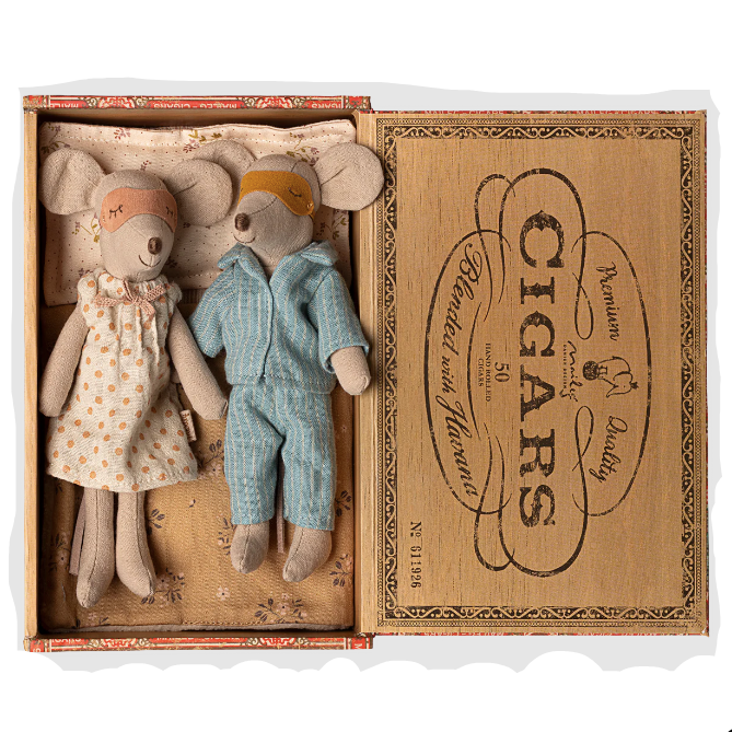Two plush toy mice in a decorative box with &