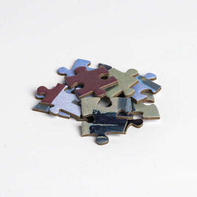 Puzzle: René Magritte's Golconda